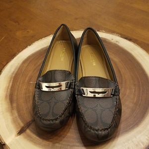 Black and brown Coach loafers
